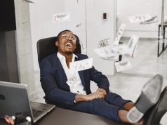 12 Passive Income Ideas You Should Try in 2026 — A Beginner’s Step-by-Step Guide african-man-black-suit-guy-sitting-table-businessman-with-money-scaled.jpg