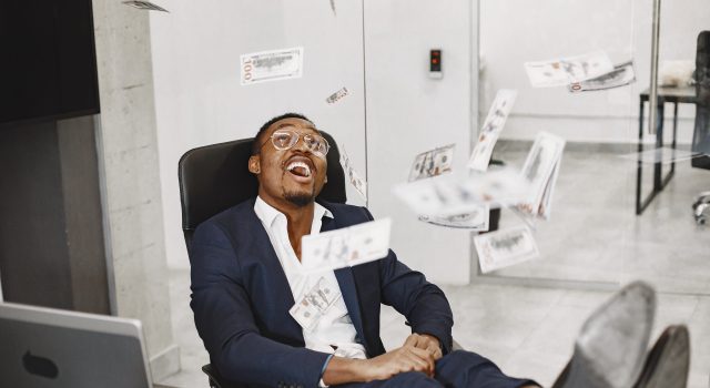 12 Passive Income Ideas You Should Try in 2026 — A Beginner’s Step-by-Step Guide african-man-black-suit-guy-sitting-table-businessman-with-money-scaled.jpg