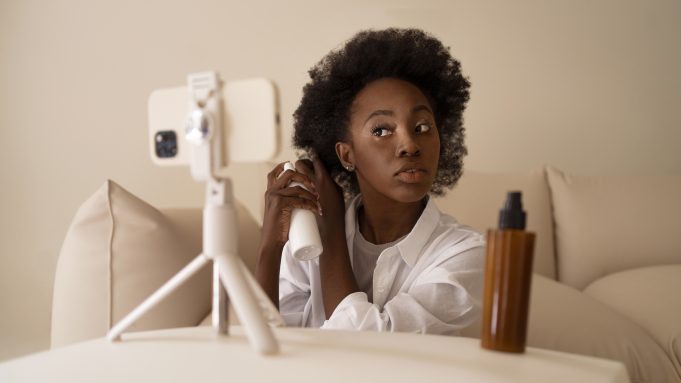 How to Get Paid on Instagram with 1000 Followers: Ultimate Guide front-view-woman-styling-hair