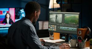 How to Start a Faceless YouTube Channel in 7 Easy Steps Before 2026 video-maker-producing-montage-with-artistic-software-color-adjustment-scaled.